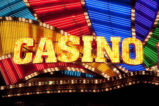 Live dealer spinning the roulette wheel